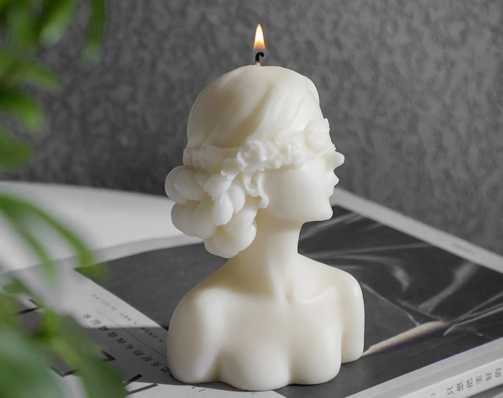 auramma-collections-funky-kawaii-white-elegant-blindfolded-lady-girl-chamomile-scented-candle-lit
